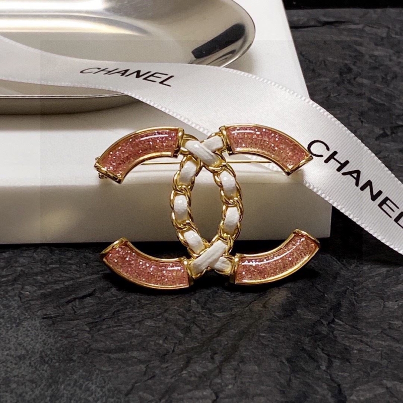 Ch*el brooches